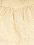 White Top & Shrug With Cream Skirt